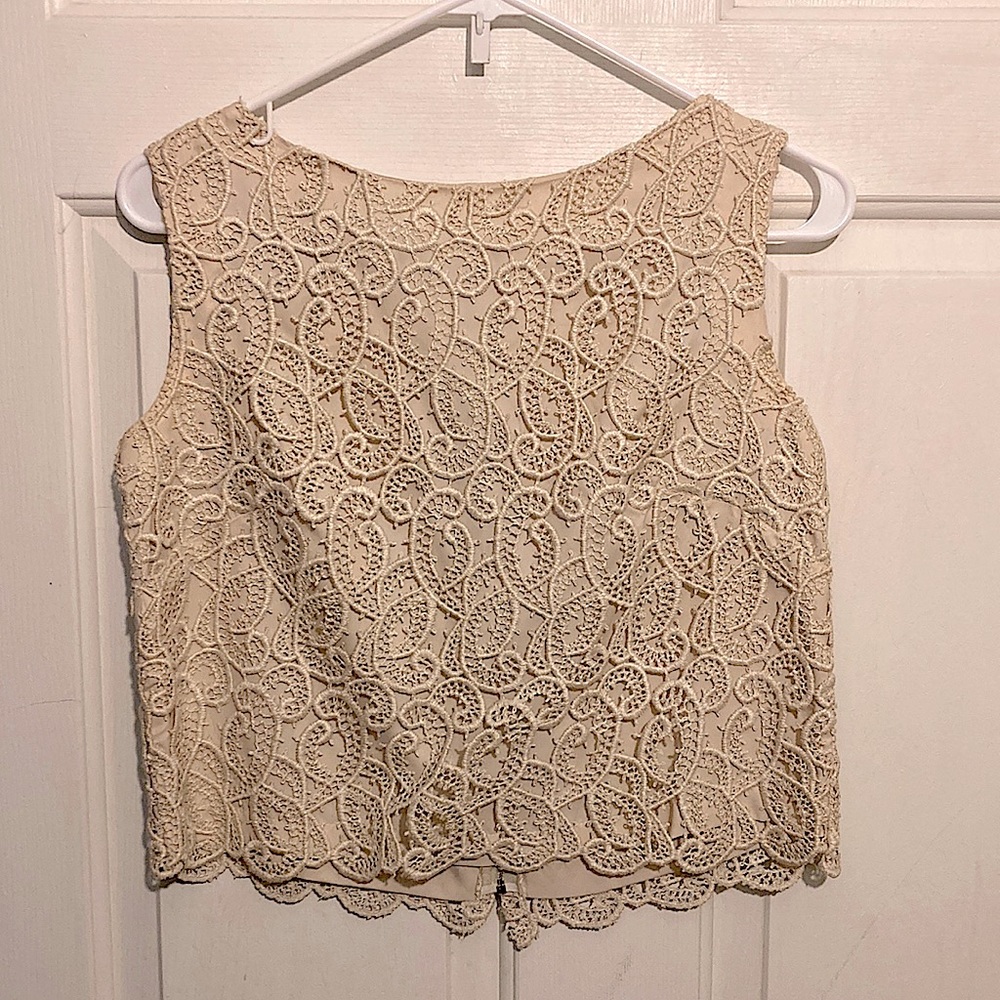 Patty Woodard top in size 7-8, made of 100% cotton.